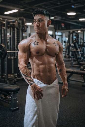 Rugged, inked, and irresistibly confident. - Alternate Photo