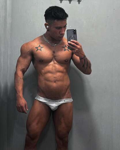 Rugged, inked, and irresistibly confident. - Alternate Photo