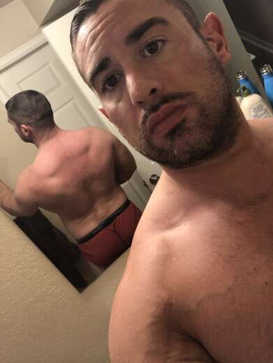 Muscle man ready to assist - Alternate Photo