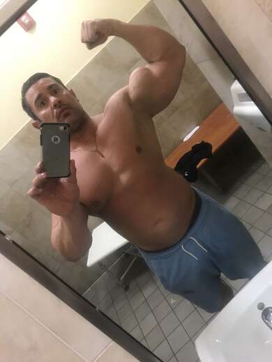 Muscle man ready to assist - Alternate Photo