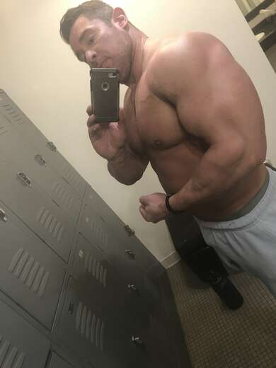 Muscle man ready to assist - Alternate Photo