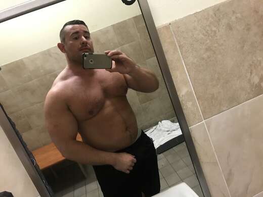 Muscle man ready to assist - Alternate Photo